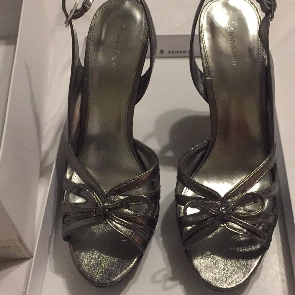 Calvin Klein silver platform heels